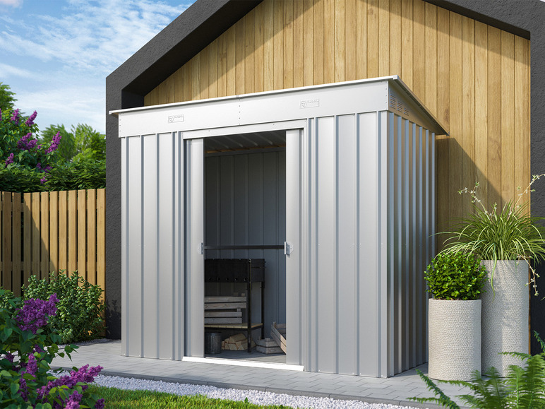 Un abri de jardin en métal avec porte coulissante.