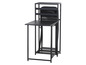 Une table pliante noire avec une chaise assortie rangée dans la table.