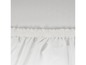 Bordure élastique blanche d'un drap-housse.