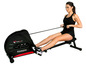 Une femme utilise un rameur ChrisTopher RW2000.
