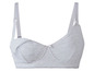 Un soutien-gorge d'allaitement gris rembourré avec des bretelles réglables.