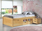 Un lit en bois avec rangement et une table de chevet.