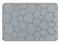 Un tapis gris avec un motif de pierre.