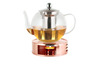 Théière en verre avec infuseur à thé sur un chauffe-thé en cuivre.