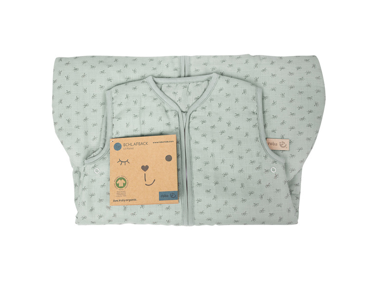 Un sac de couchage vert avec un motif floral de la marque roba.