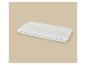 Oreiller blanc avec un motif en losanges et une bordure grise, sur fond beige.