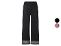 Pantalon large noir avec détails en résille.