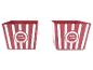 Deux boîtes à popcorn rouges avec des rayures blanches.
