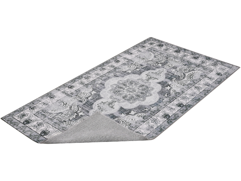 Tapis gris avec motif floral et médaillon central, avec le dos antidérapant visible.