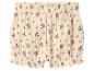 Shorts bébé beige à motif floral.