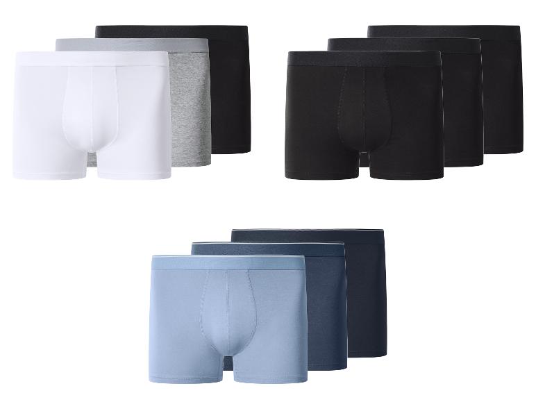 Lot de boxers pour hommes en blanc, gris, noir et bleu.