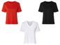 Trois t-shirts unis : rouge, noir et blanc.
