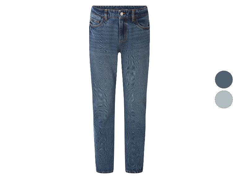 Jean bleu pour femme avec deux cercles de couleur à droite.