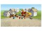 Ensemble LEGO Minecraft avec un village, des personnages et des créatures, dont un Ghast et un Golem de Fer.