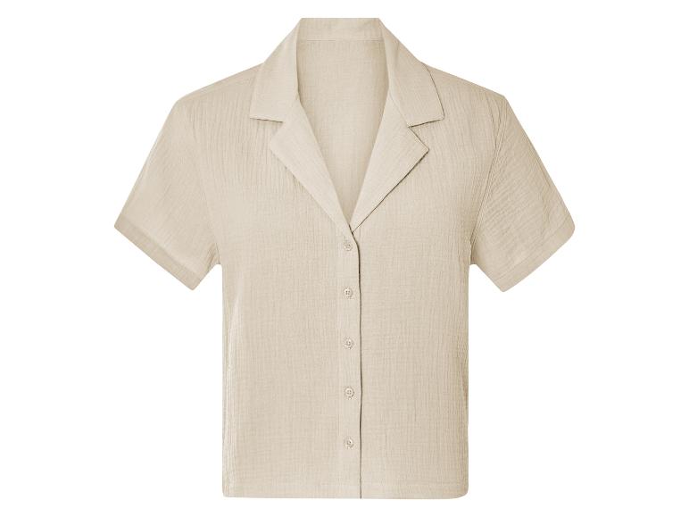 Chemise beige à manches courtes, col classique, boutonnée.