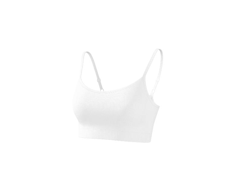 Soutien-gorge de sport blanc côtelé avec fines bretelles réglables.