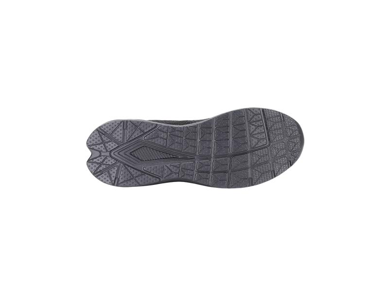 Dessous d'une chaussure de sport gris foncé avec une semelle texturée.