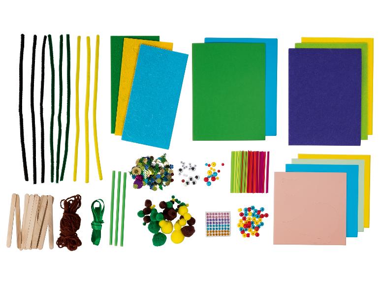 Kit de bricolage avec chenilles, feutrine, bâtonnets, pompons, yeux mobiles et perles.