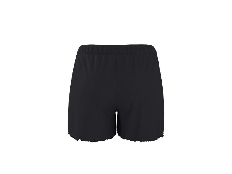 Short noir femme avec bord ondulé, aspect confortable et élégant.
