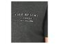 T-shirt vert foncé avec le texte : 'LIFE BEGINS at the end of COMFORT ZONE'.