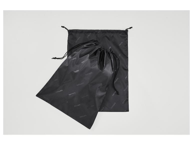 Deux sacs de rangement noirs Esmara avec cordon de serrage sur fond blanc.