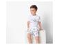 Ensemble été enfant : t-shirt blanc et short à motifs plage.
