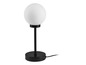 Une lampe de table noire avec un abat-jour rond blanc.