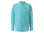 Chemise turquoise à manches longues brodée.
