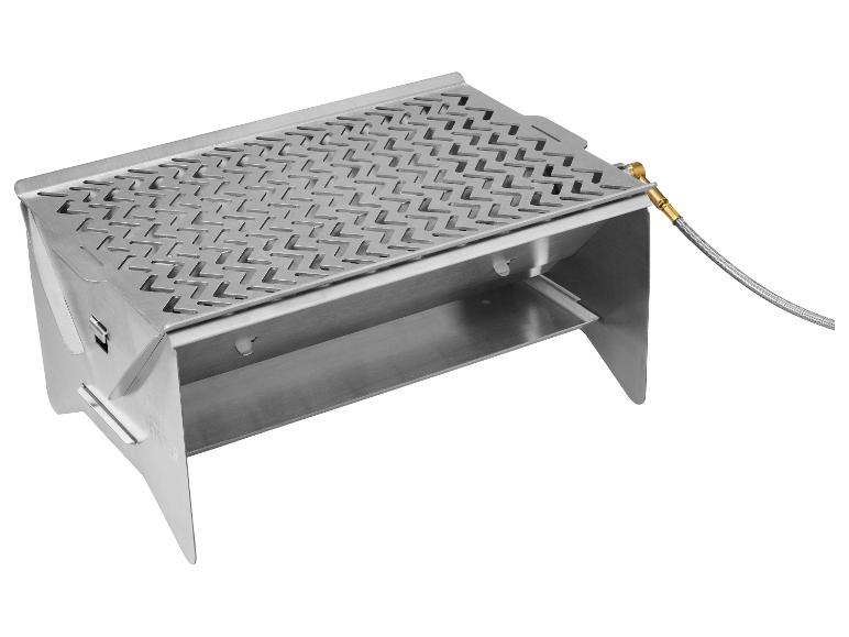 Grill à gaz portable argenté avec grille et tuyau connecté.