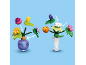 Deux bouquets de fleurs jouets colorés avec des fleurs et des vases interchangeables.