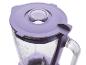 Le dessus d'un blender violet avec un pichet en verre.