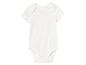 Body bébé blanc à manches courtes.