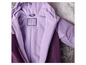Une veste en polaire violette avec une étiquette pour écrire un nom.