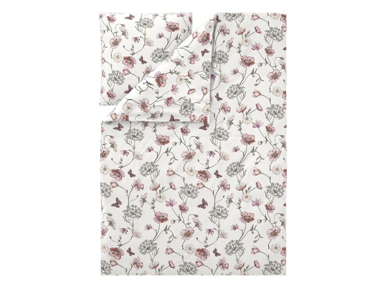 Parure de lit blanche avec motif floral rose et papillons.