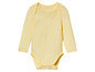 Un body bébé jaune à manches longues.