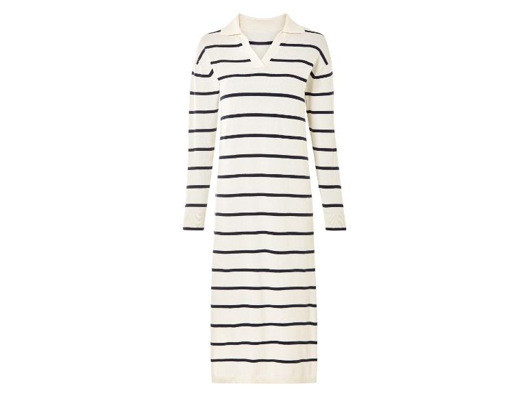 Une robe à rayures blanches et noires à manches longues.