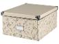 Boîte de rangement beige à motifs floraux.