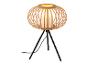 Une lampe de table en bois avec un abat-jour rond et un trépied en métal noir.