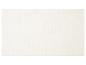 Tapis de bain blanc cassé avec un motif de lignes ondulées.
