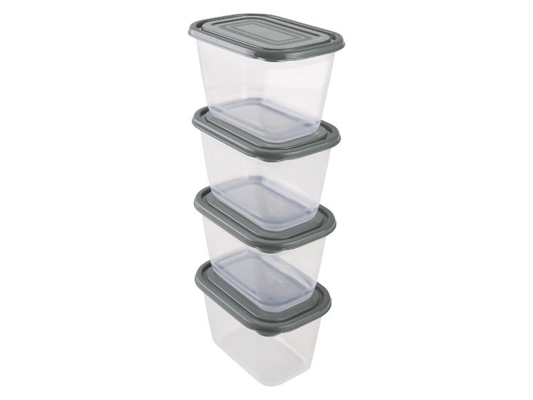 Boîtes de conservation alimentaires empilables transparentes avec couvercles gris.