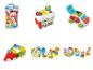 Jouets Clemmy souples, comprenant des blocs, un seau, une voiture et un train.