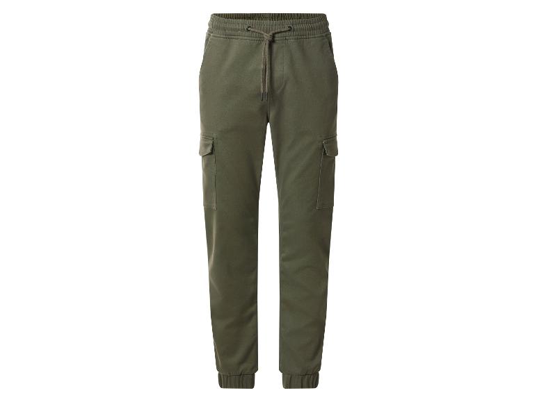 Pantalon cargo vert pour homme avec cordon de serrage à la taille et chevilles resserrées.