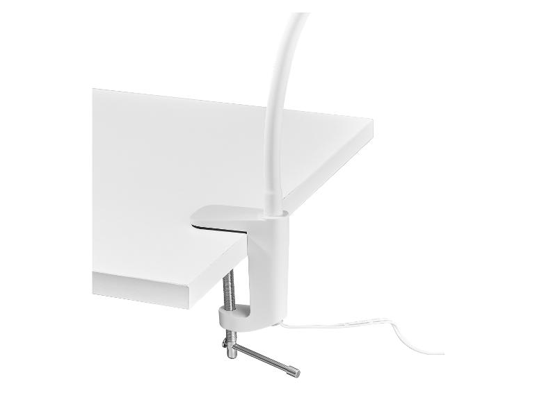 Lampe de bureau blanche à pince fixée à une table blanche