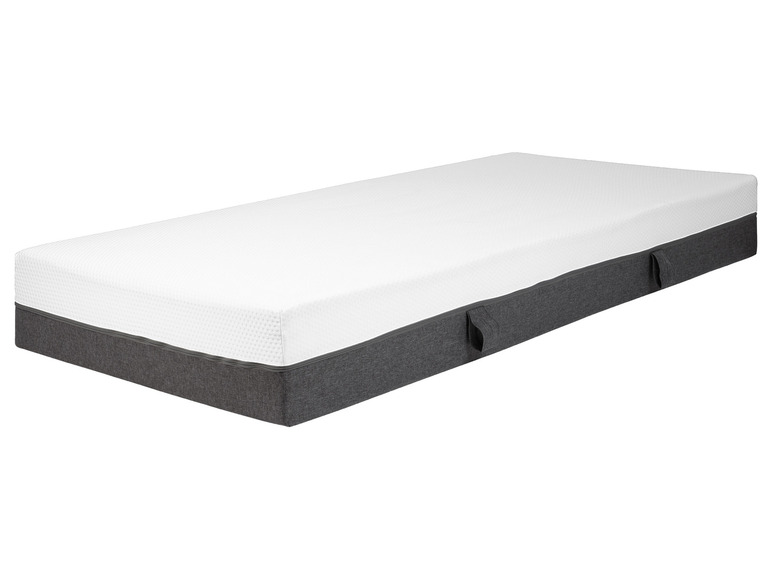 Un matelas blanc avec une housse grise et des poignées.