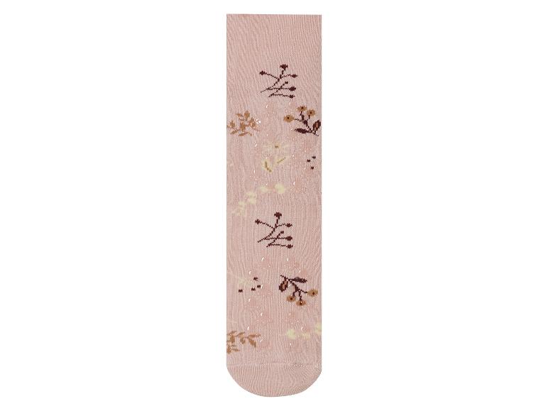Des chaussettes roses avec un motif floral.