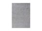 Tapis gris avec motif ondulé en relief.