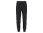 Pantalon de survêtement noir avec un petit logo Kappa.