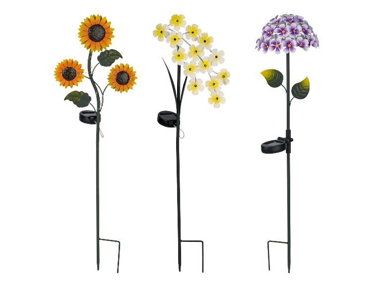 Trois lampes solaires de jardin en forme de fleurs : tournesols, fleurs blanches et hortensias violets.