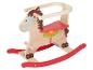 Un cheval à bascule en bois avec des patins rouges.