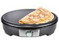 Une crêpière SilverCrest avec une crêpe cuite